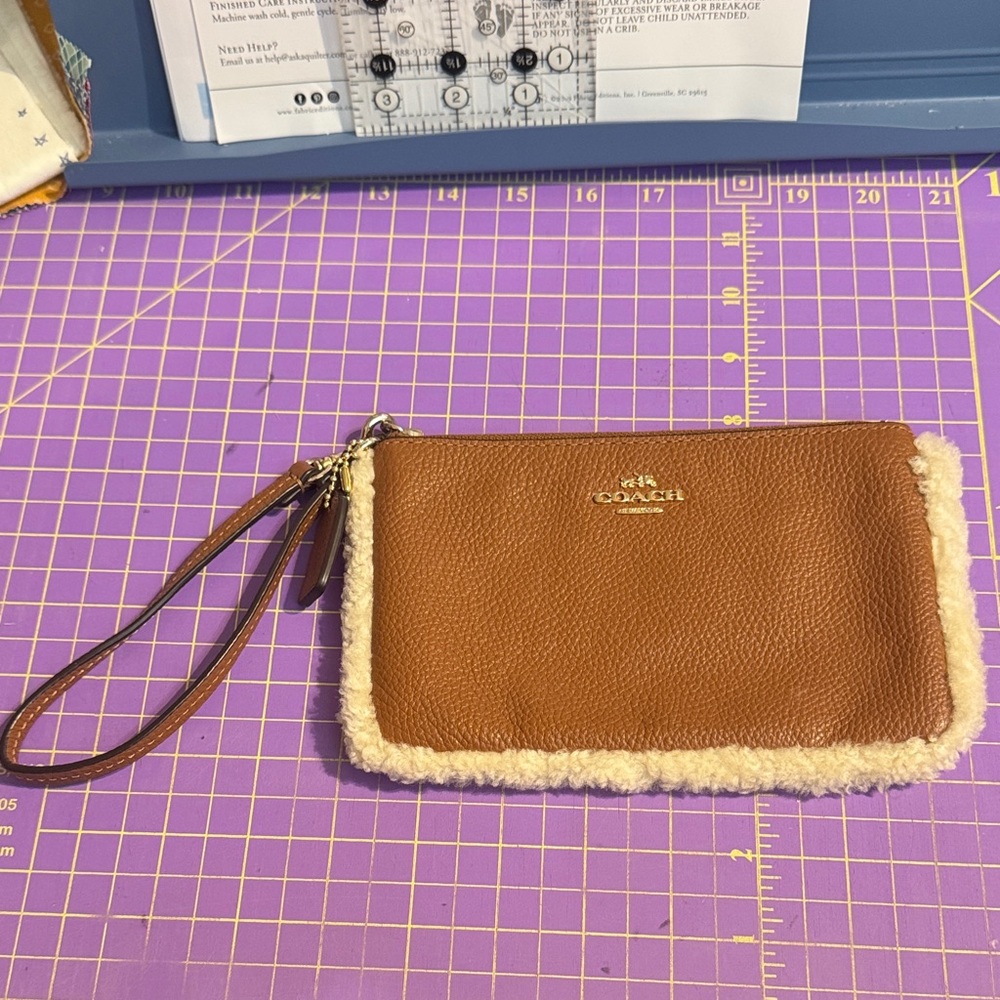 Coach Nolita Shearling Wristlet